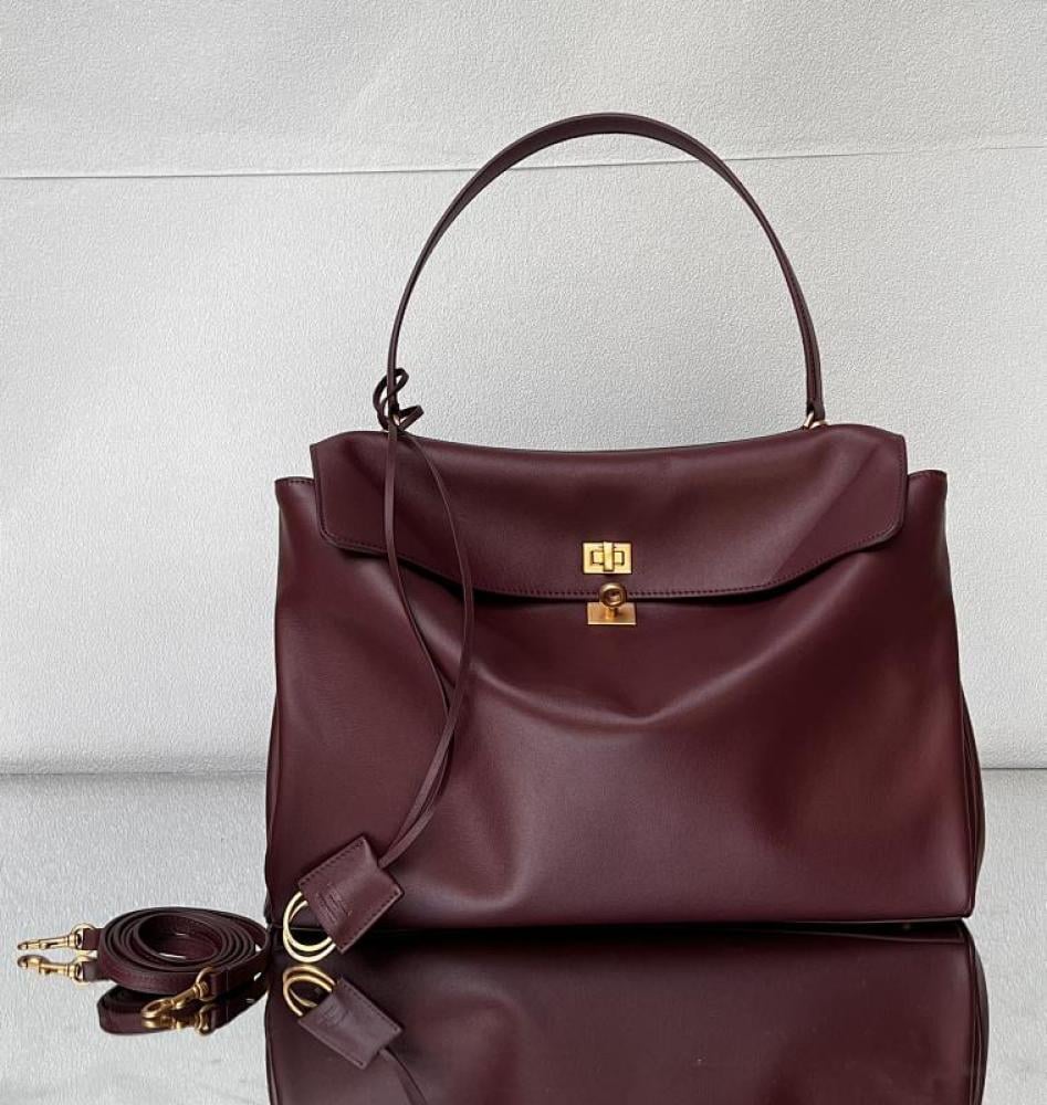 Luxury Top Handle Bag Style 102978865